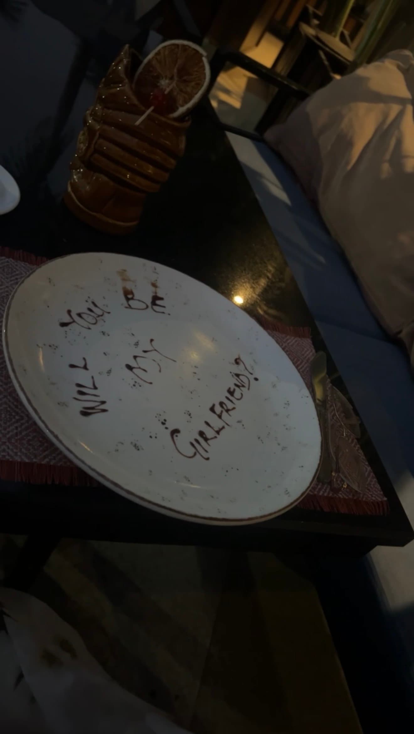 A dessert plate asking Esther-Praise to be Jeremiah's girlfriend