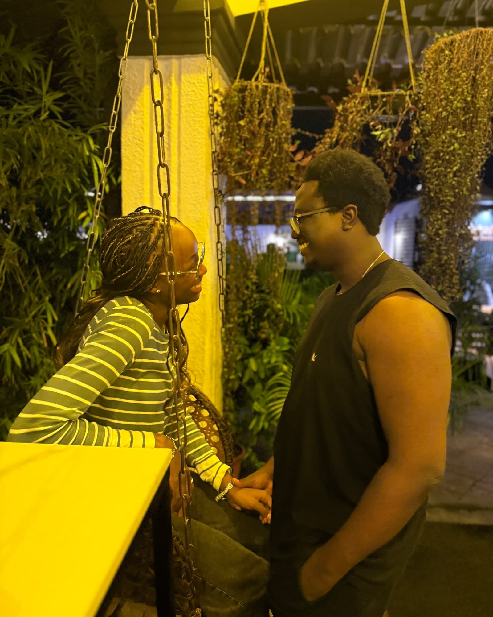 Esther-Praise and Jeremiah smiling together during the years between friendship and dating